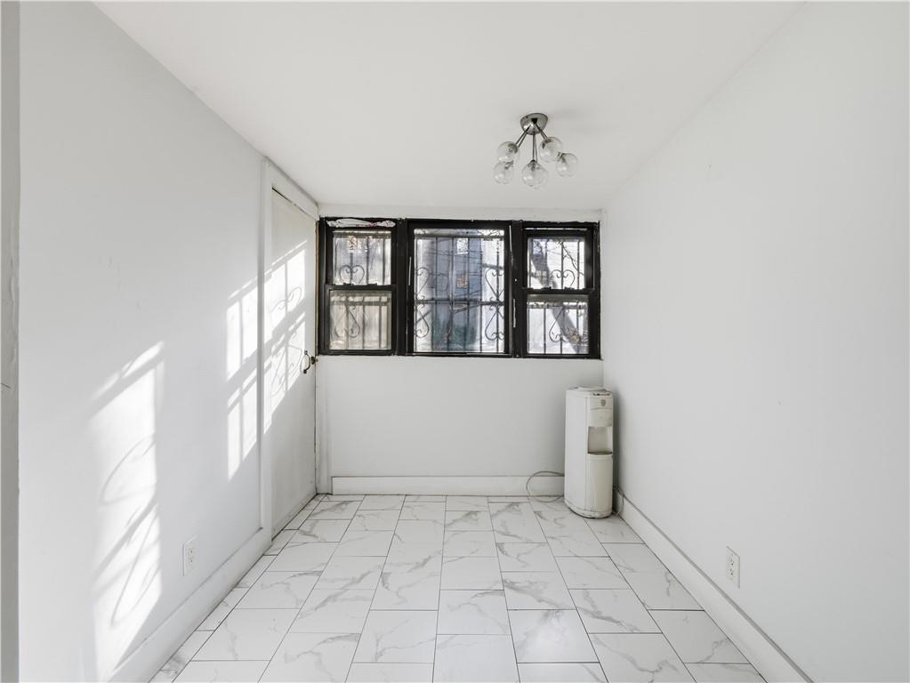 372 Parkside Avenue Brooklyn, NY 11226 - Photo 12 of 34 a view of an empty room with a window