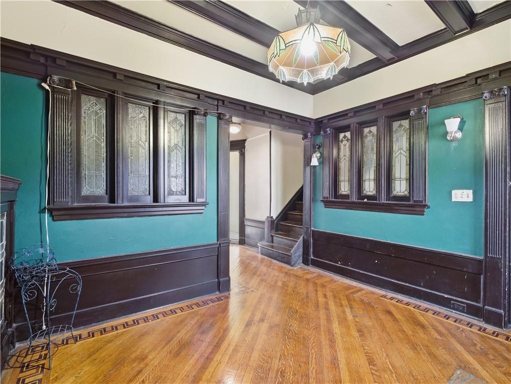 372 Parkside Avenue Brooklyn, NY 11226 - Photo 19 of 34 a room with window and a chandelier