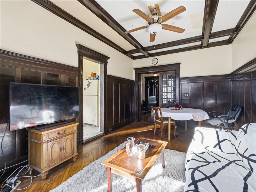 372 Parkside Avenue Brooklyn, NY 11226 - Photo 23 of 34 a outdoor space with lots of tables a mirror and a rug