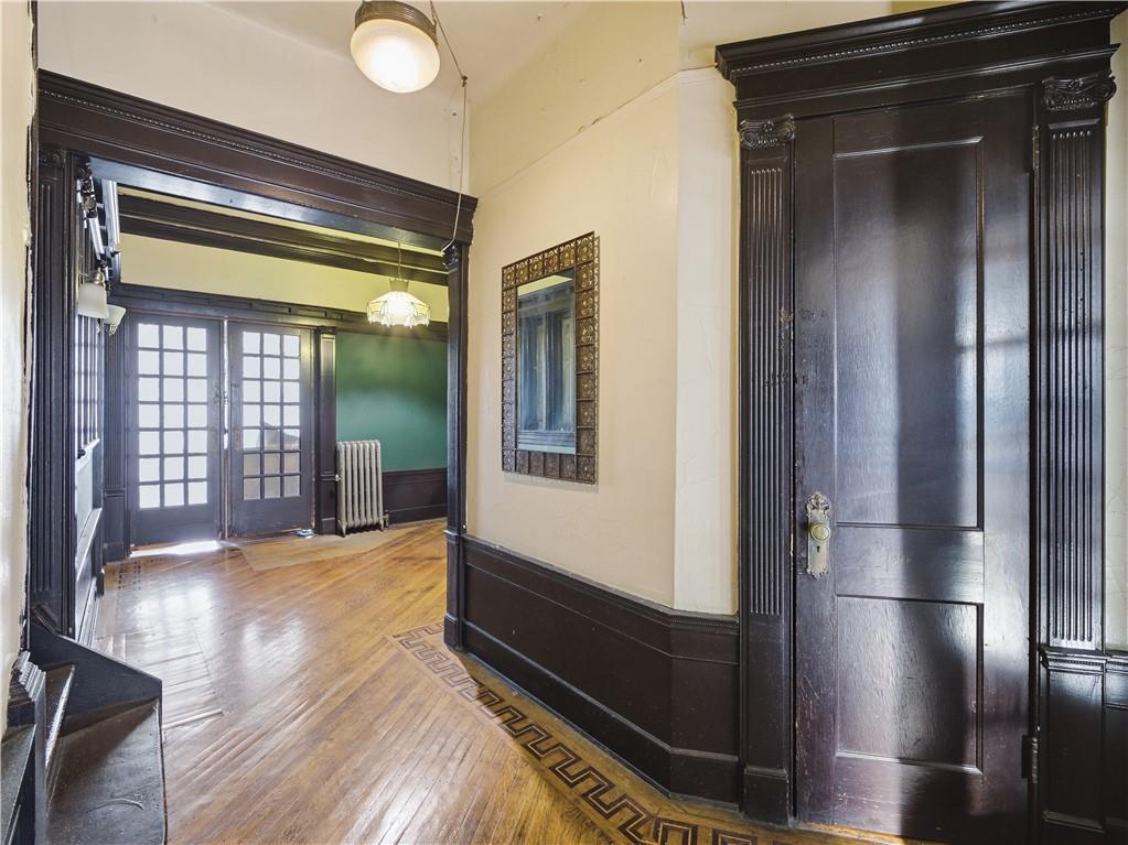 372 Parkside Avenue Brooklyn, NY 11226 - Photo 24 of 34 a view of gallery with wooden floor