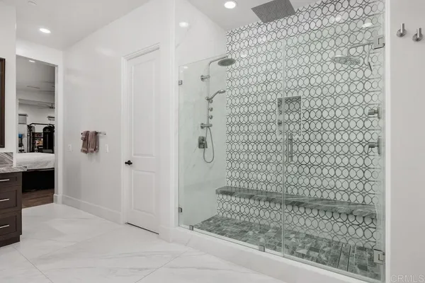 a bedroom with a bed and a table