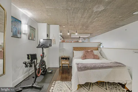 a bedroom with furniture and a view of bedroom