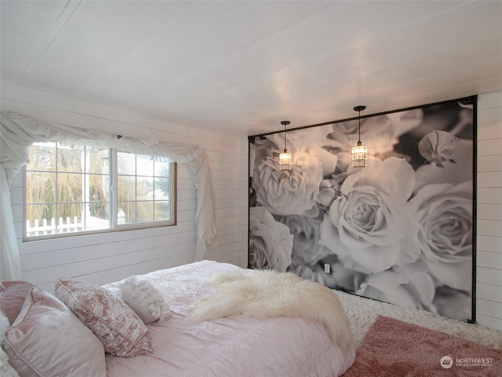 31 Daisy Lane Sequim, WA 98382 - Photo 17 of 40 a bedroom with a bed and a window