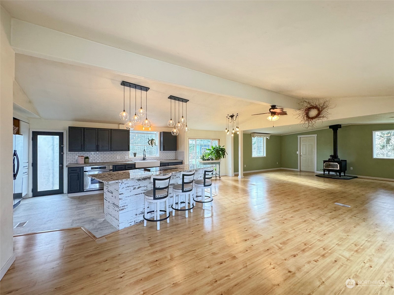 31 Daisy Lane Sequim, WA 98382 - Photo 4 of 40 a view of a livingroom with furniture and a flat screen tv