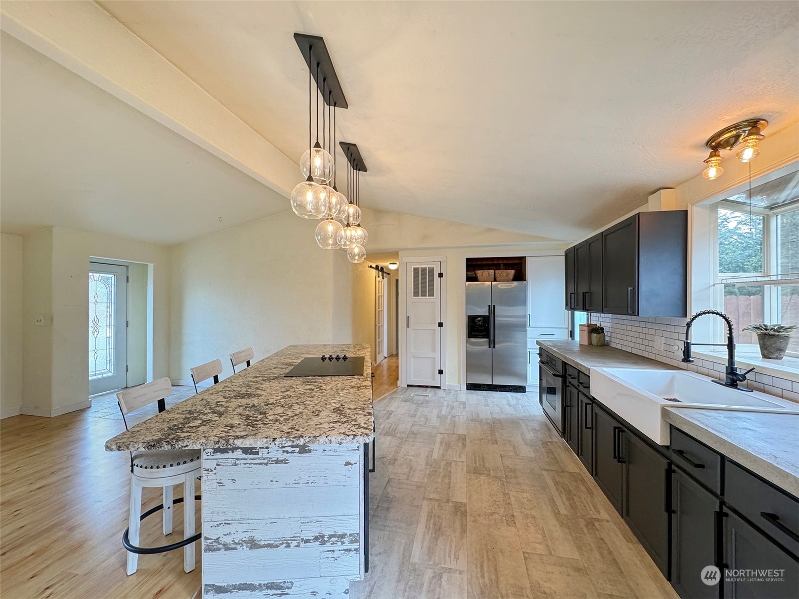 31 Daisy Lane Sequim, WA 98382 - Photo 6 of 40 a large bathroom with a sink and a mirror