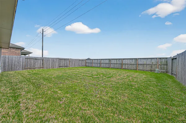 a view of a yard with a slide