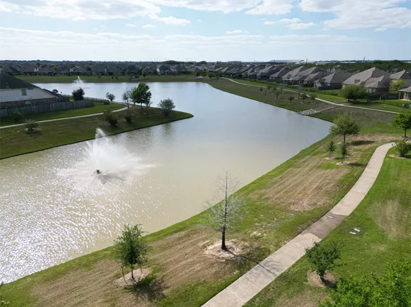 a view of a lake with a big yard