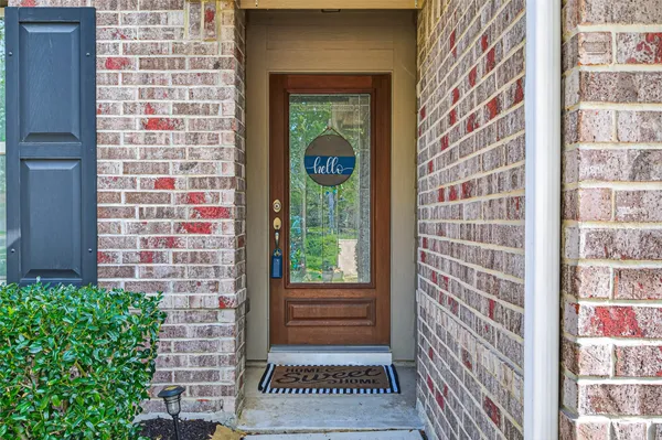a brick house with a large window