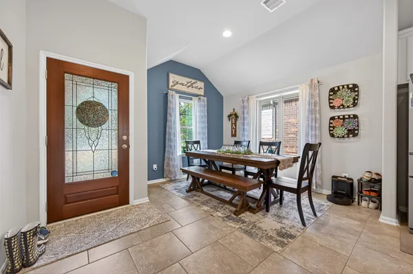 a view of a livingroom with furniture and window