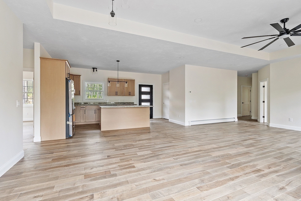 315 South Athol Road Phillipston, MA 01331 - Photo 11 of 42 a view of a kitchen with a stove cabinets and wooden floor