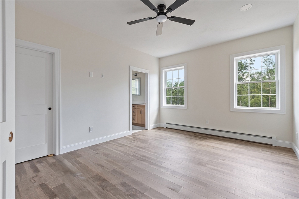 315 South Athol Road Phillipston, MA 01331 - Photo 14 of 42 a view of an empty room with a window and wooden floor