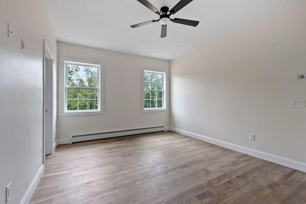 315 South Athol Road Phillipston, MA 01331 - Photo 15 of 42 a view of an empty room with wooden floor and a window