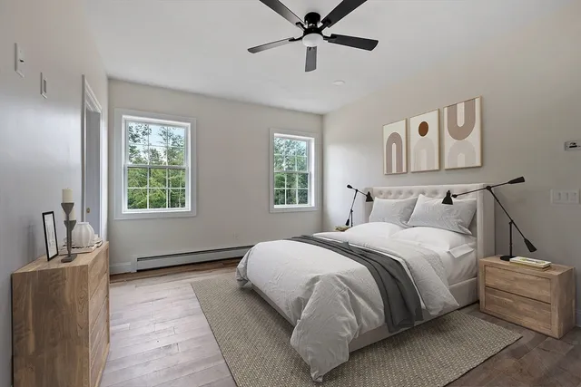 a bedroom with a bed and window