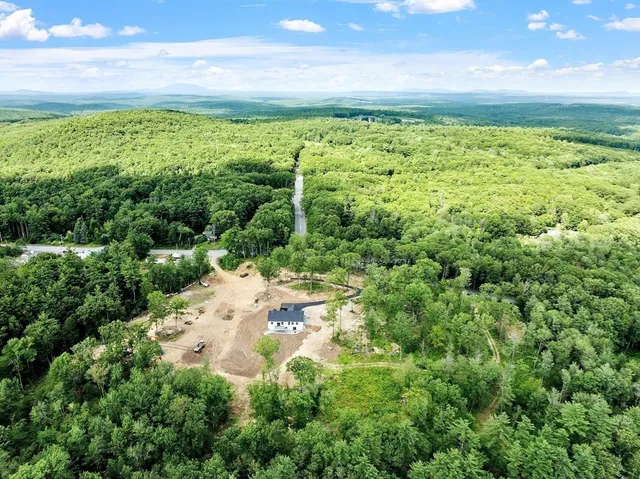 a view of a yard with an ocean