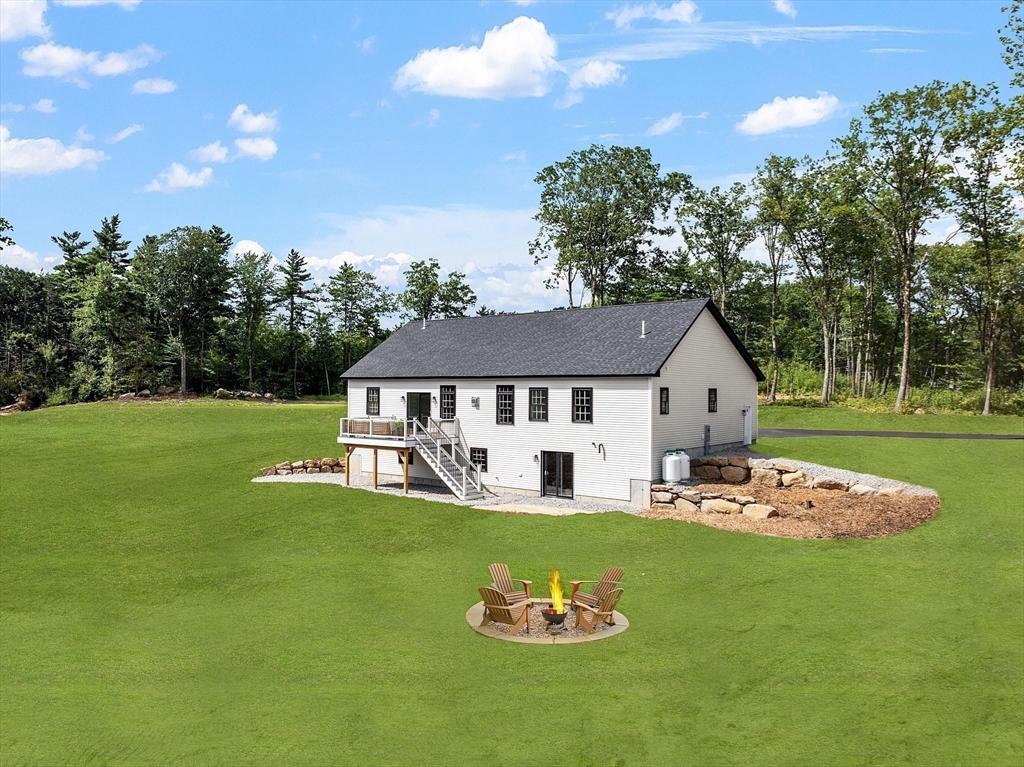 315 South Athol Road Phillipston, MA 01331 - Photo 38 of 42 a front view of a house with a garden and yard