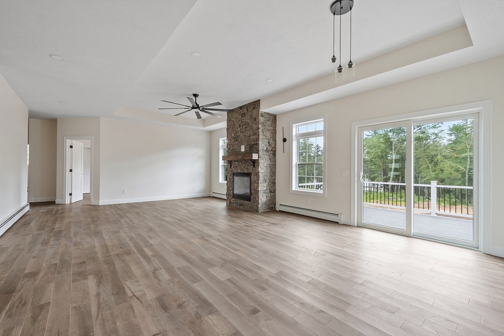 315 South Athol Road Phillipston, MA 01331 - Photo 5 of 42 a view of empty room with wooden floor and fan