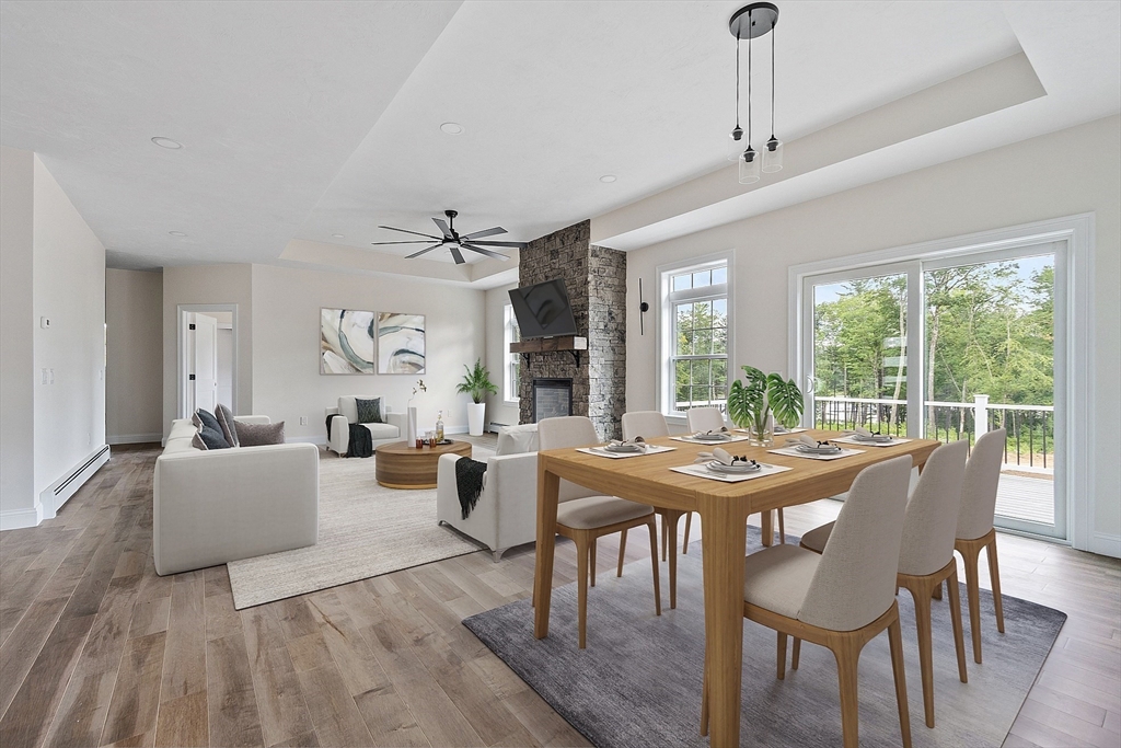 315 South Athol Road Phillipston, MA 01331 - Photo 6 of 42 a view of a dining room with furniture wooden floor a livingroom and chandelier