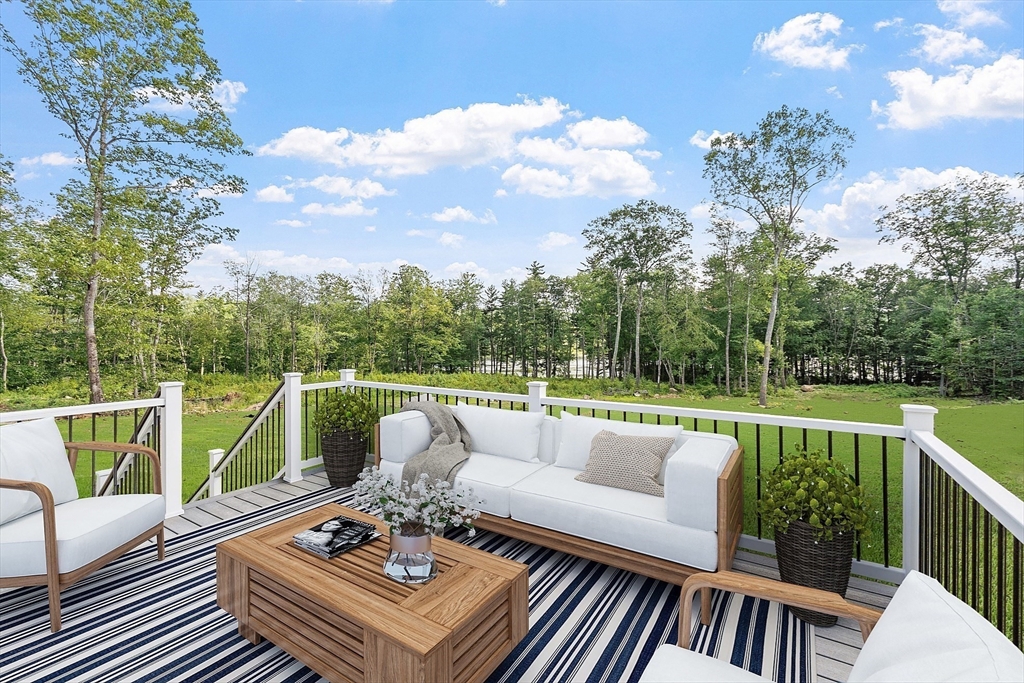 315 South Athol Road Phillipston, MA 01331 - Photo 8 of 42 a view of balcony with furniture and a potted plant