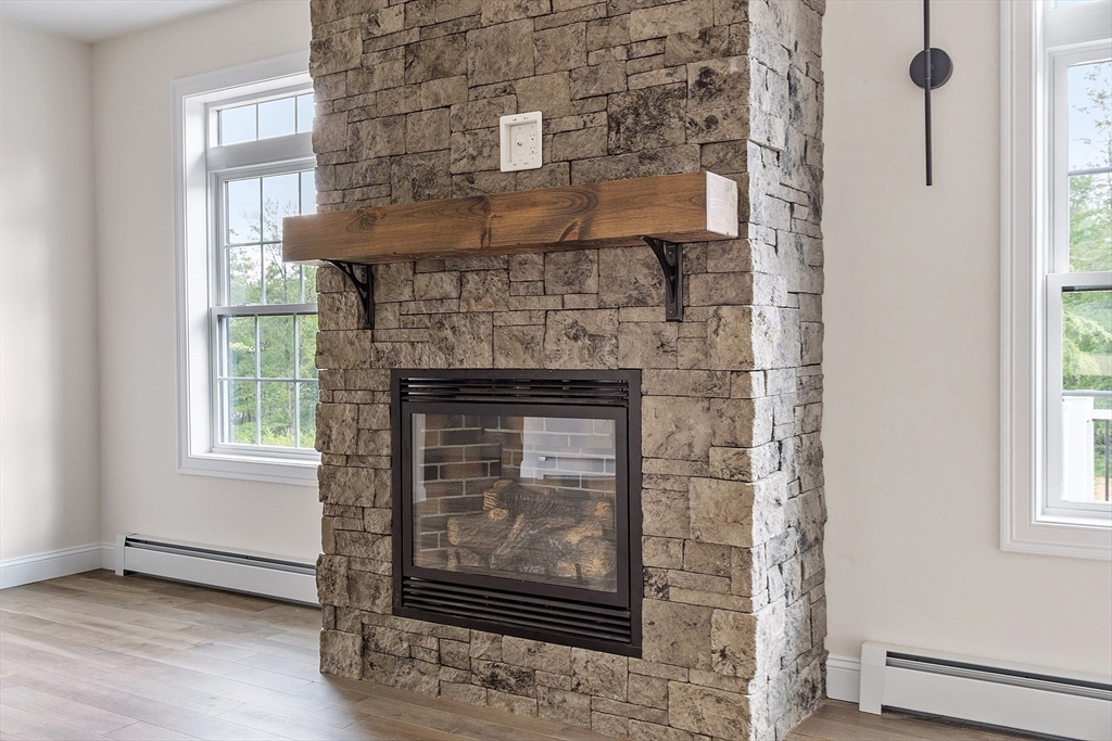 315 South Athol Road Phillipston, MA 01331 - Photo 9 of 42 a living room with a fireplace