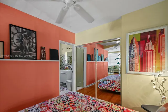 a bedroom with furniture and window