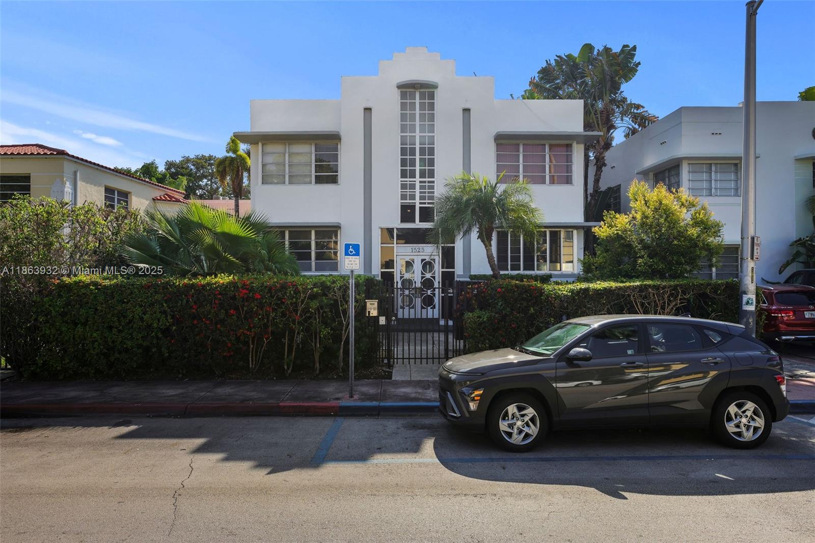 1525 Meridian Avenue, Unit 202 Miami Beach, FL 33139 - Photo 23 of 23 a car parked in front of a house