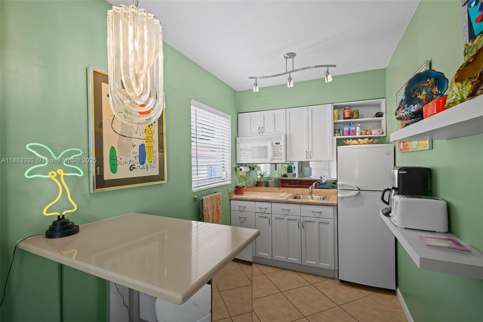 1525 Meridian Avenue, Unit 202 Miami Beach, FL 33139 - Photo 7 of 23 a room with storage and utility