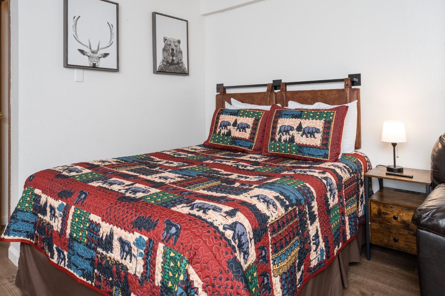 7540 Henness Circle, Unit B101 Yosemite West, CA 95389 - Photo 7 of 20 a bedroom with a bed and window