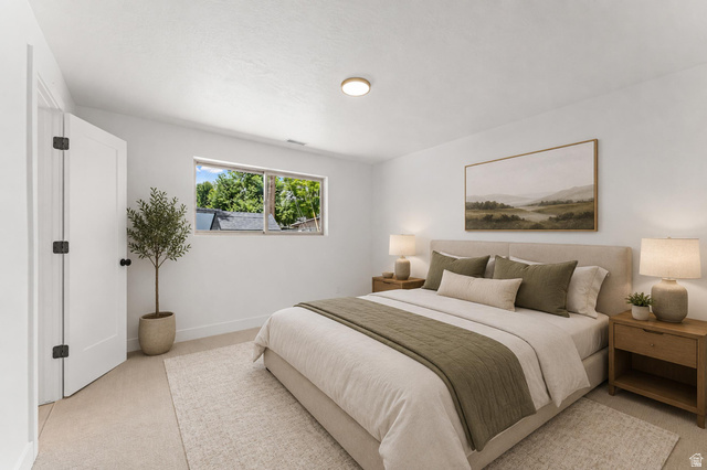 1898 West 600 South Provo, UT 84601 - Photo 18 of 32 Bright bedroom with white walls and light-colored flooring