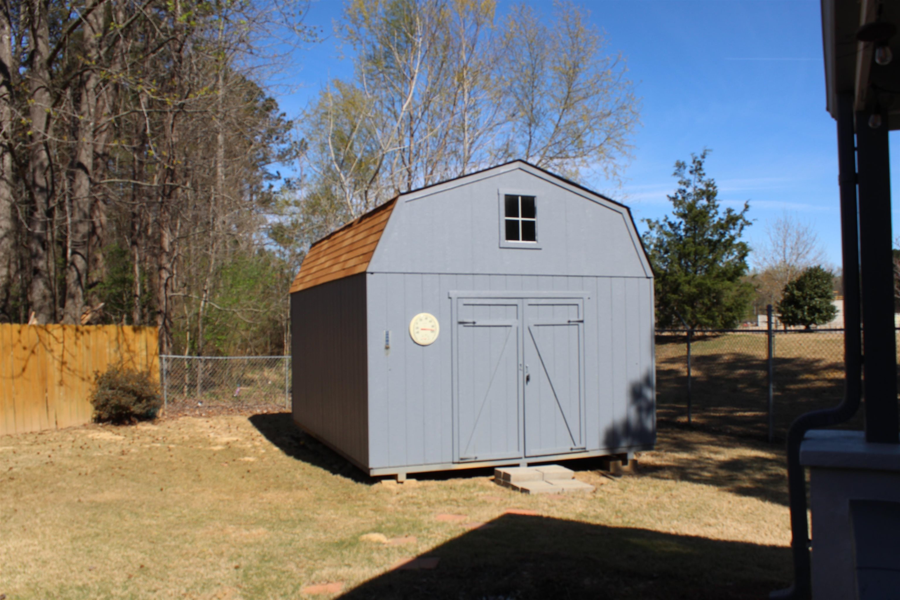 6442 Bending River Road Bartlett, TN 38135 - Photo 19 of 22 View of shed with a fenced backyard