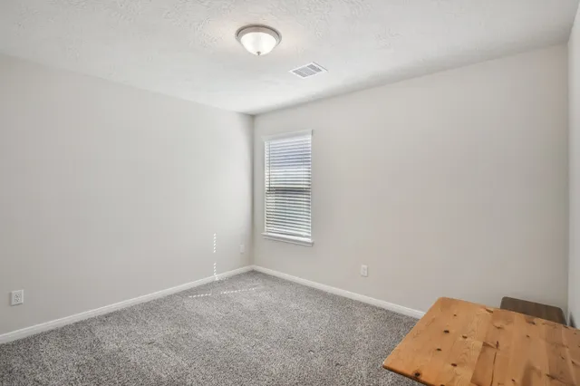 a bathroom with a sink toilet and bathtub