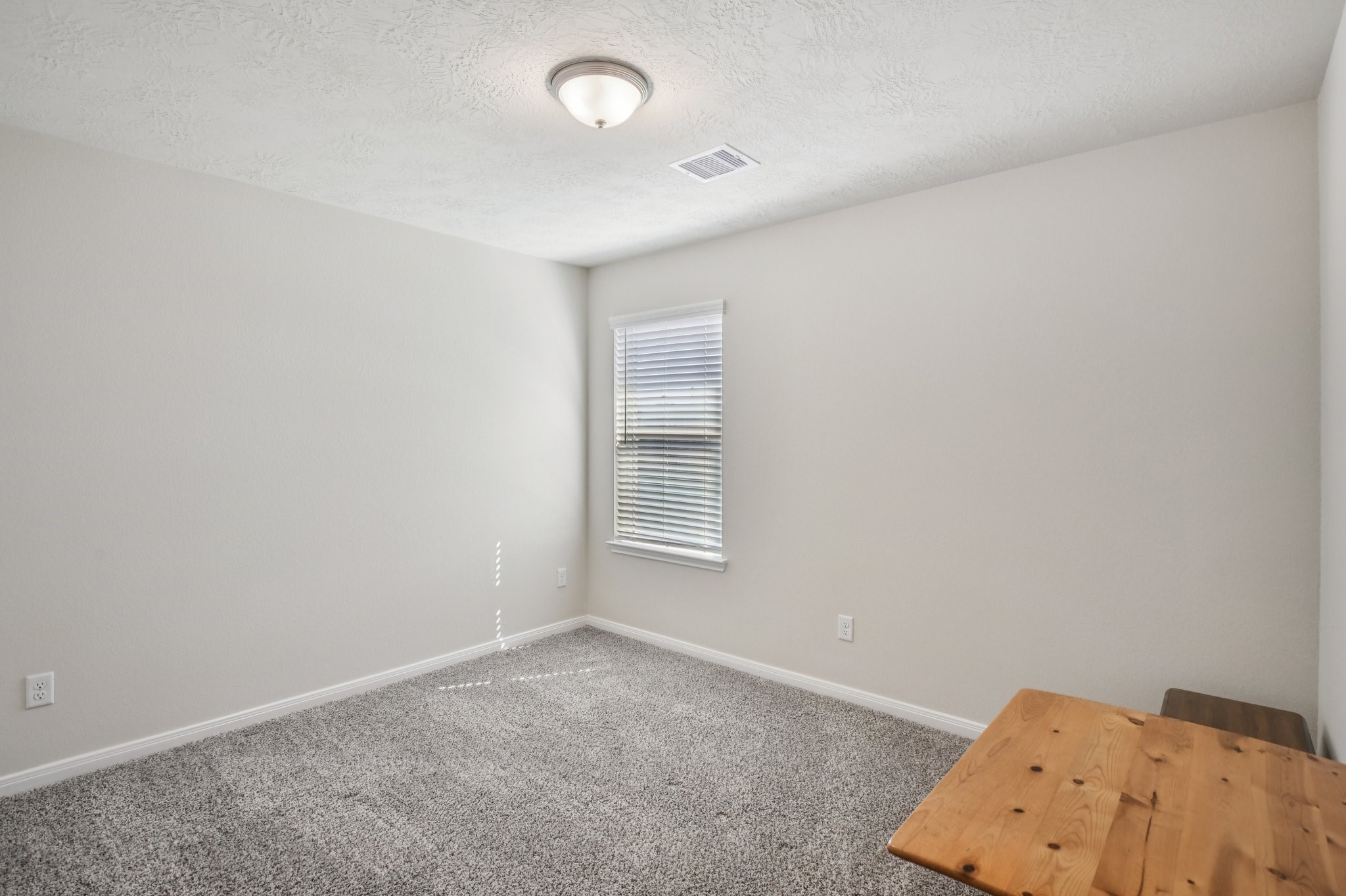 199 Racetrack Lane Montgomery, TX 77356 - Photo 20 of 40 an empty room with windows
