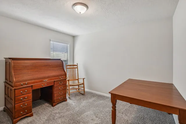 an empty room with mirror