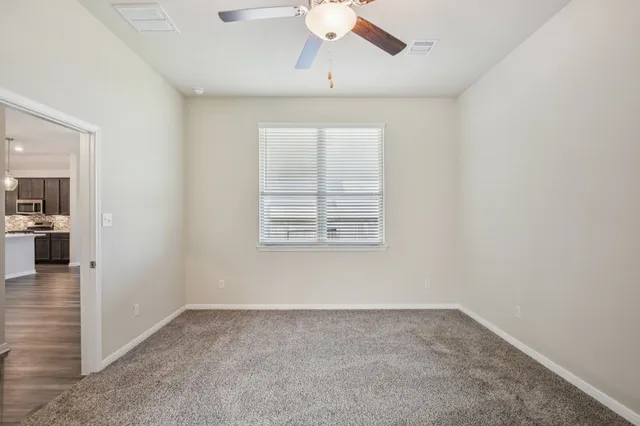 a view of an empty walk in closet