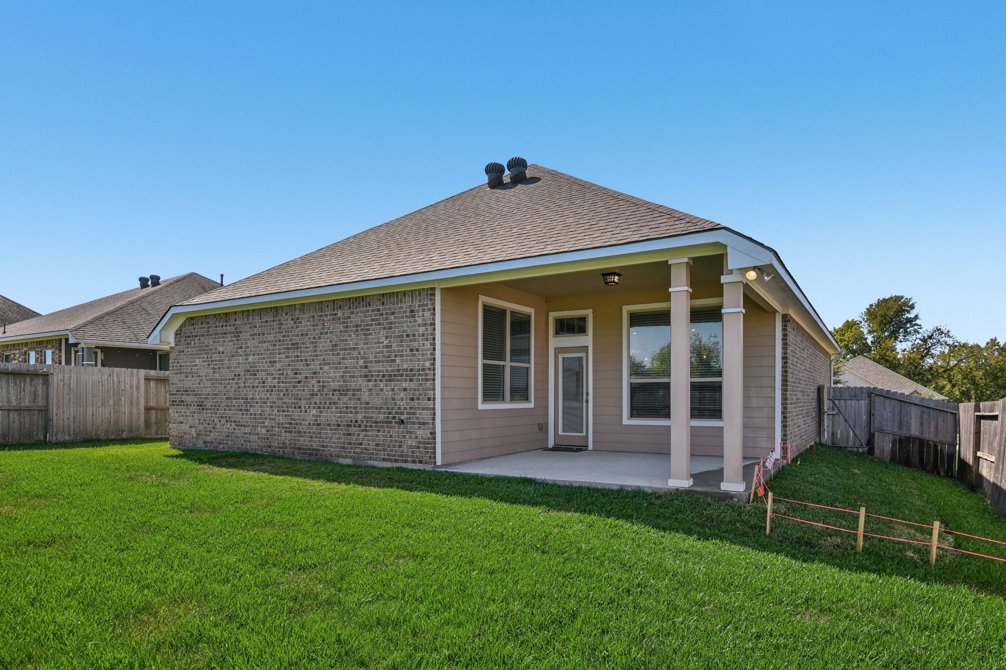 199 Racetrack Lane Montgomery, TX 77356 - Photo 35 of 40 a front view of a house with a garden