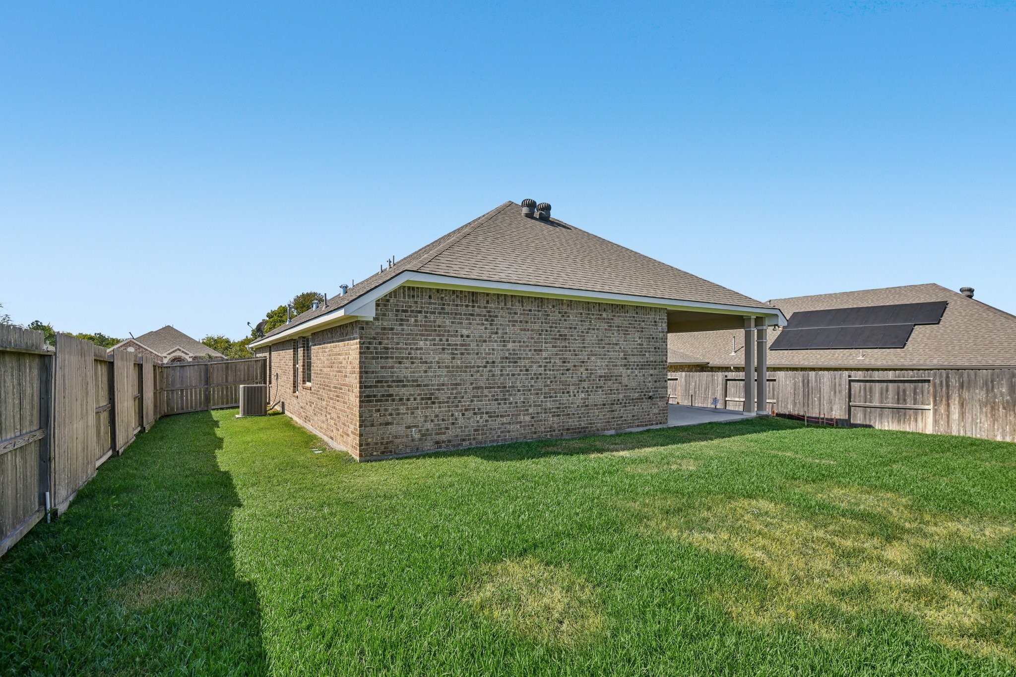 199 Racetrack Lane Montgomery, TX 77356 - Photo 37 of 40 a brick house with a yard