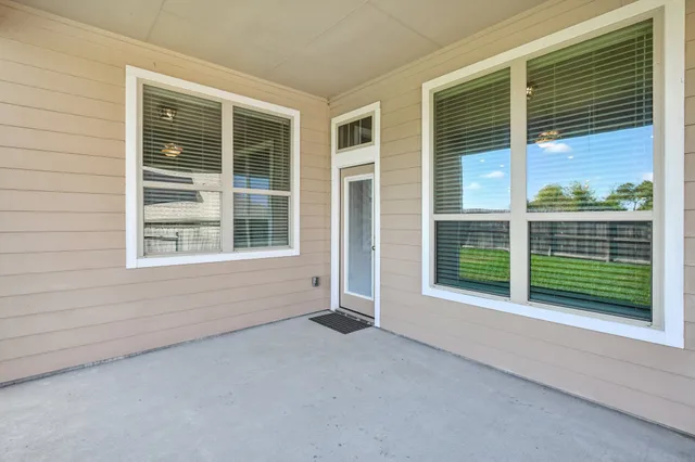 a brick house with a yard