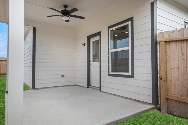 a view of a livingroom with a yard and garage