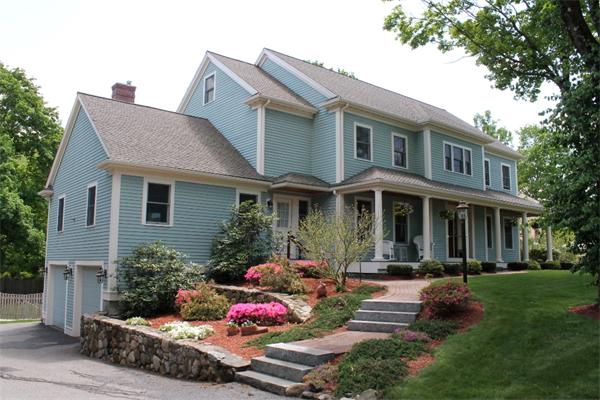 28 Columbus Street Lexington, MA 02421 - Photo 1 of 27 a front view of a house with garden