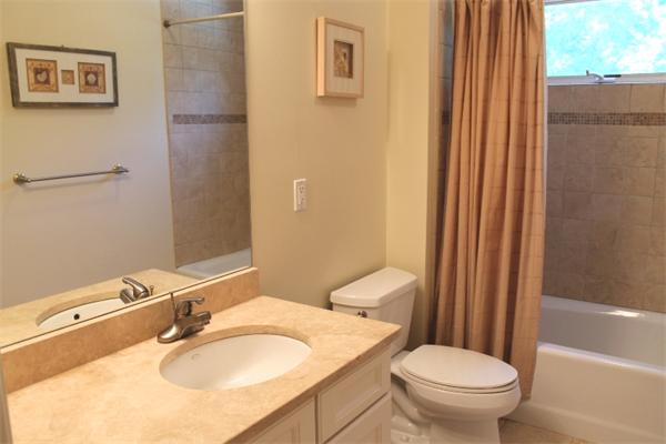 28 Columbus Street Lexington, MA 02421 - Photo 18 of 27 a bathroom with a sink toilet and shower