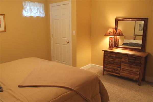 28 Columbus Street Lexington, MA 02421 - Photo 24 of 27 a bedroom with a bed and cabinets