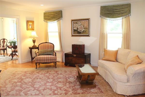 28 Columbus Street Lexington, MA 02421 - Photo 4 of 27 a living room with furniture and a window