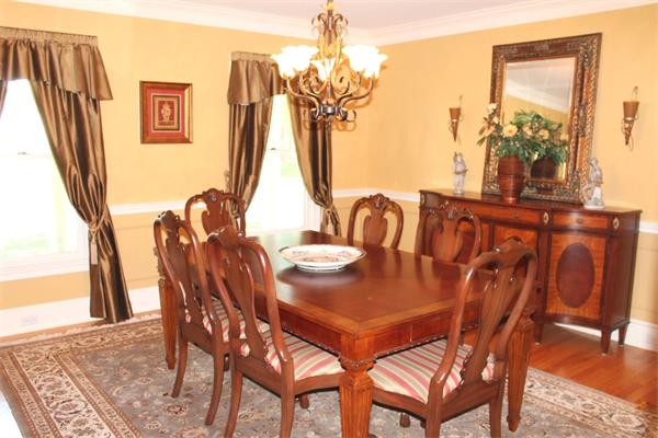 28 Columbus Street Lexington, MA 02421 - Photo 5 of 27 a view of a dining room with furniture and wooden floor