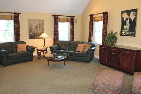 28 Columbus Street Lexington, MA 02421 - Photo 7 of 27 a living room with furniture and a window