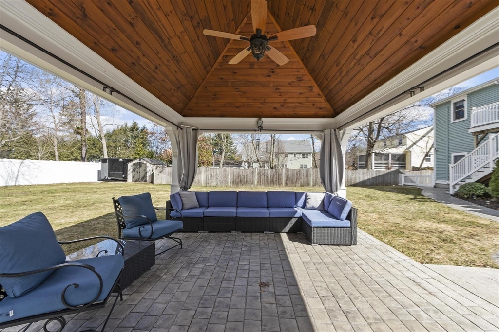 97 Hartwell Road Bedford, MA 01730 - Photo 34 of 42 a building outdoor space with patio furniture