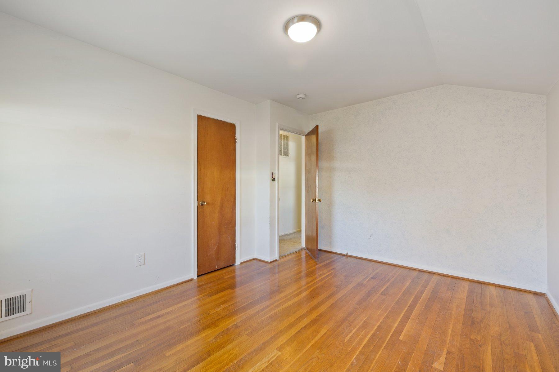 3151 Castleleigh Road Silver Spring, MD 20904 - Photo 22 of 42 Bright and airy space with warm wood floors.