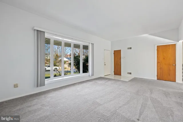 an empty room with window