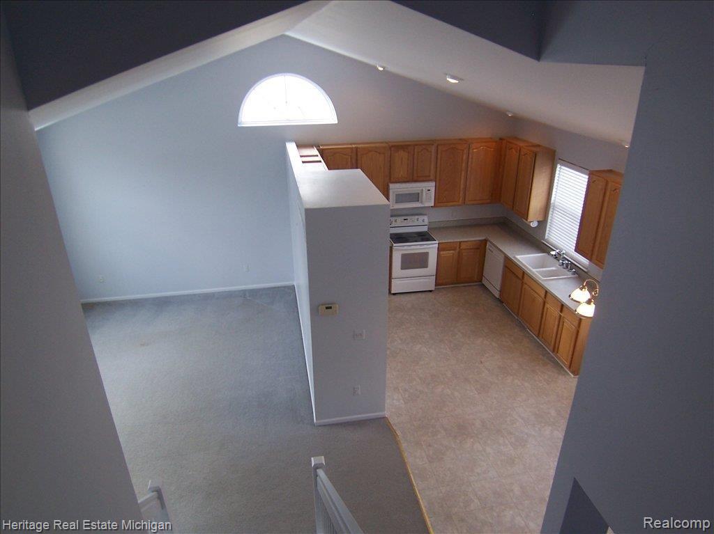 2547 Ravine Side North Howell, MI 48843 - Photo 7 of 23 Living Room/Kitchen