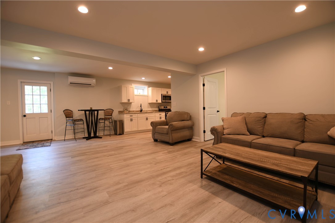 1448 Canterbury Road St. Stephens Church, VA 23148 - Photo 27 of 57 Downstairs Spacious open-concept living room featu