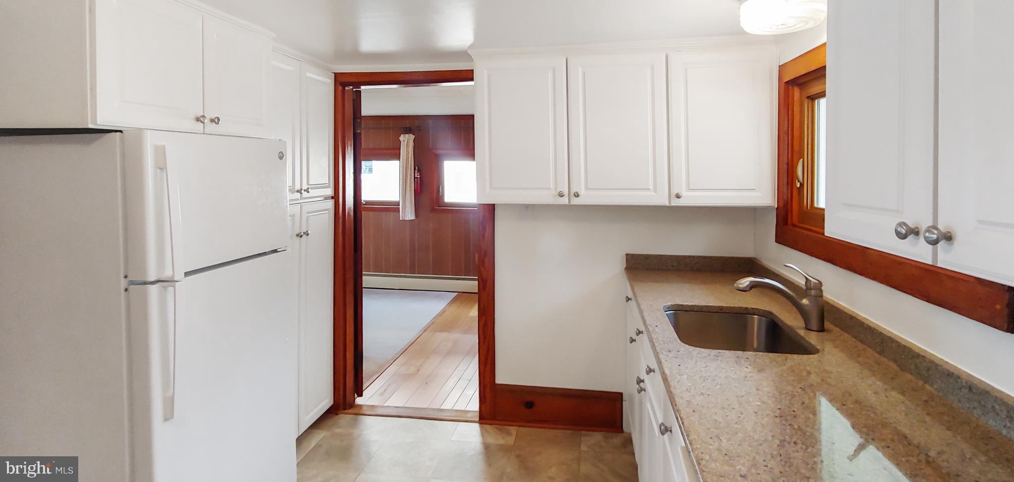 18211 River Road Tall Timbers, MD 20690 - Photo 11 of 60 Bright Kitchen on East Side of Home