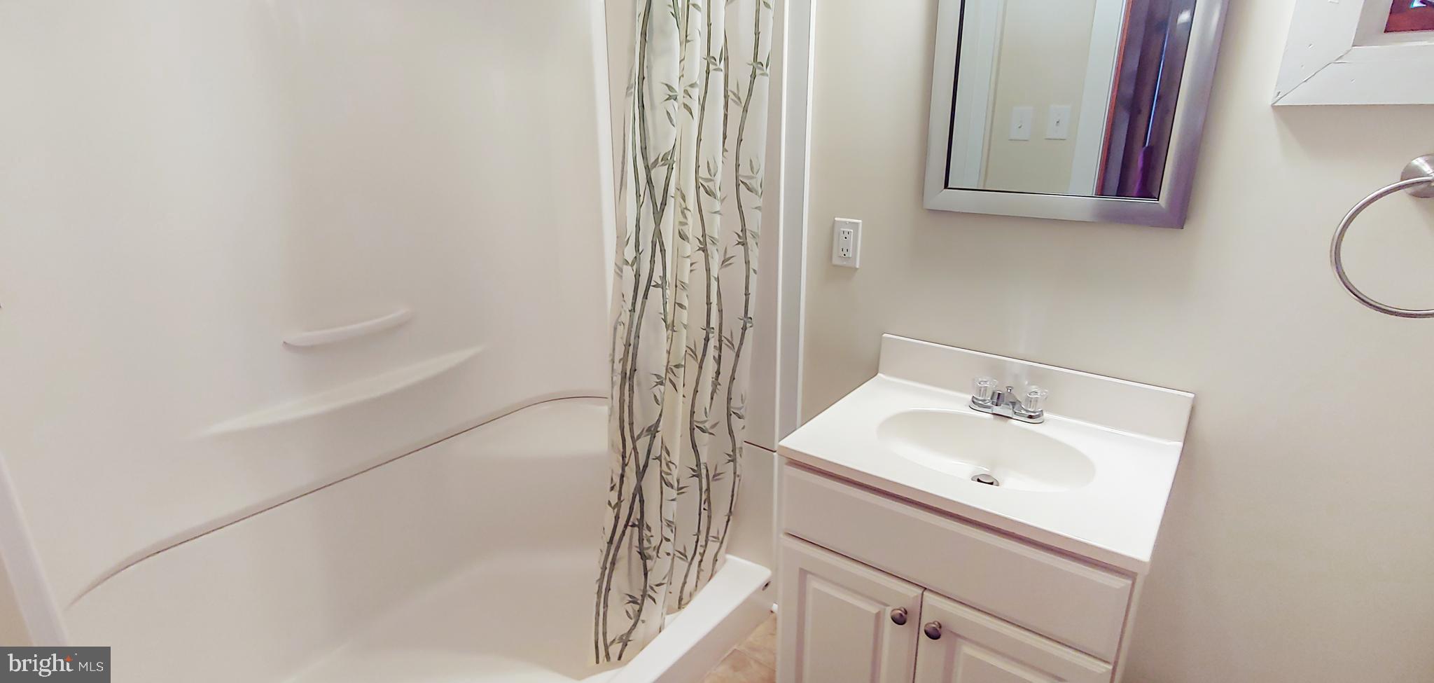 18211 River Road Tall Timbers, MD 20690 - Photo 33 of 60 Full Bathroom on Main Level